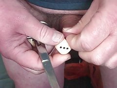 Foreskin with scissors and 3 dice